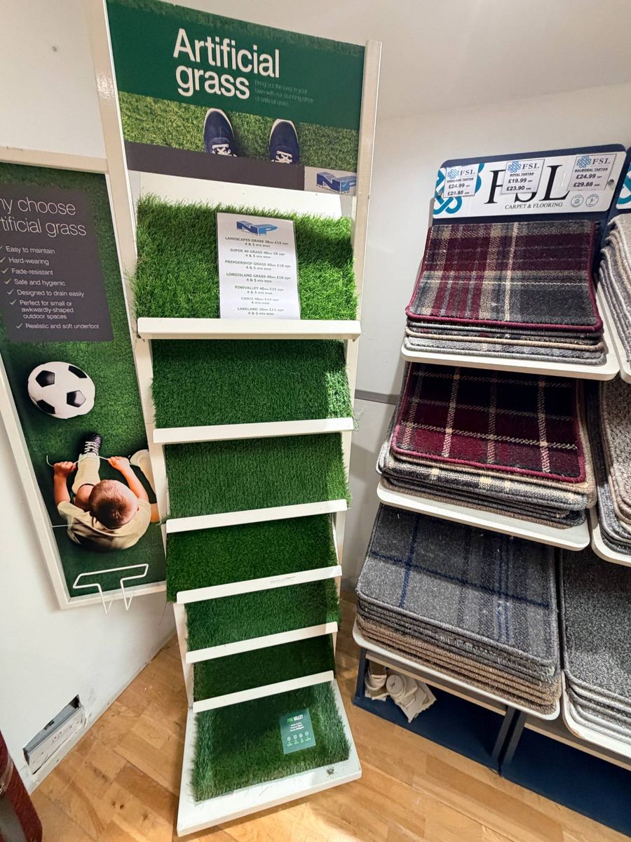 Artificial grass samples and tartan carpets at N & P Flooring Glasgow